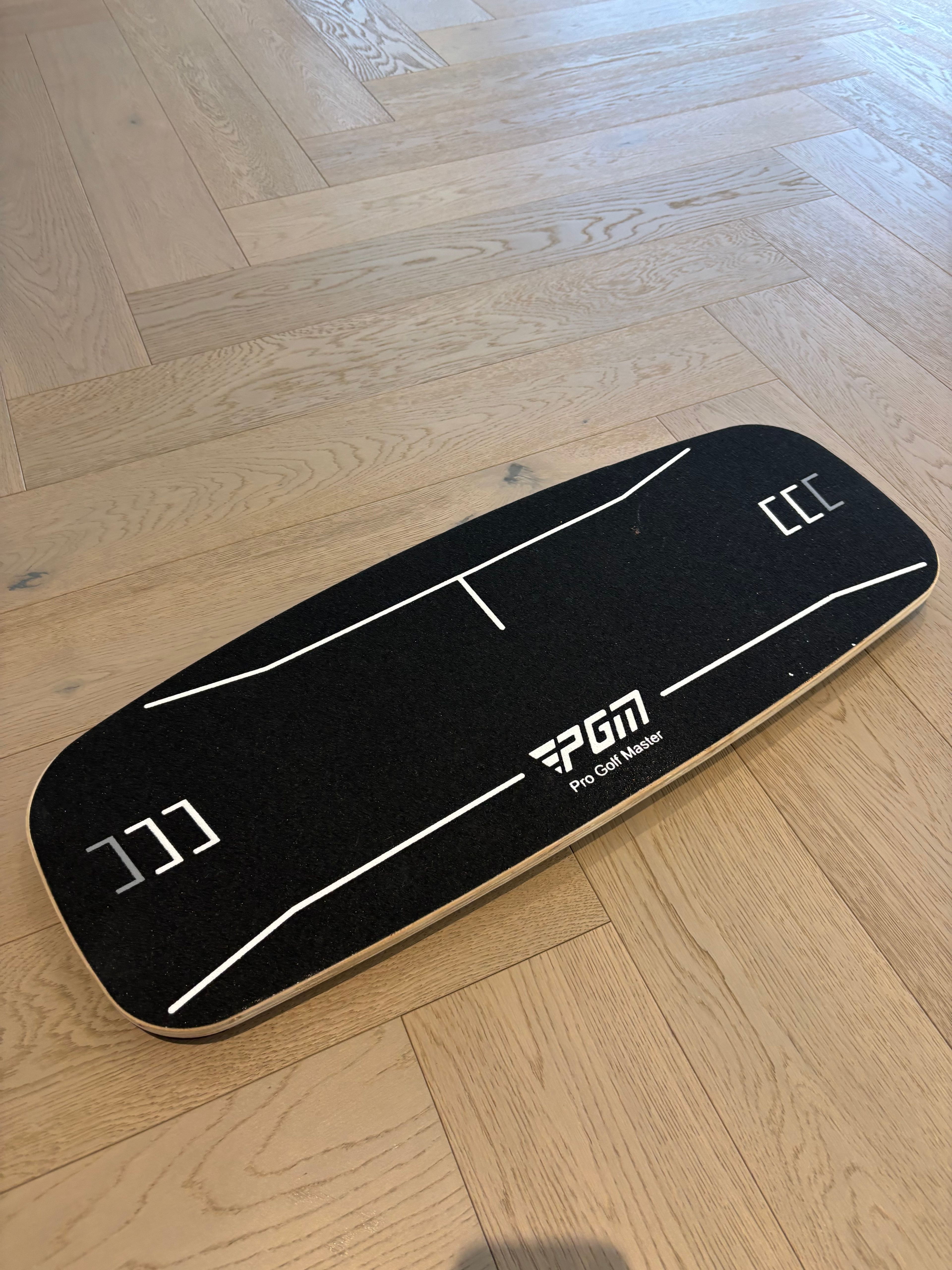 Power shift / balance board for swing training